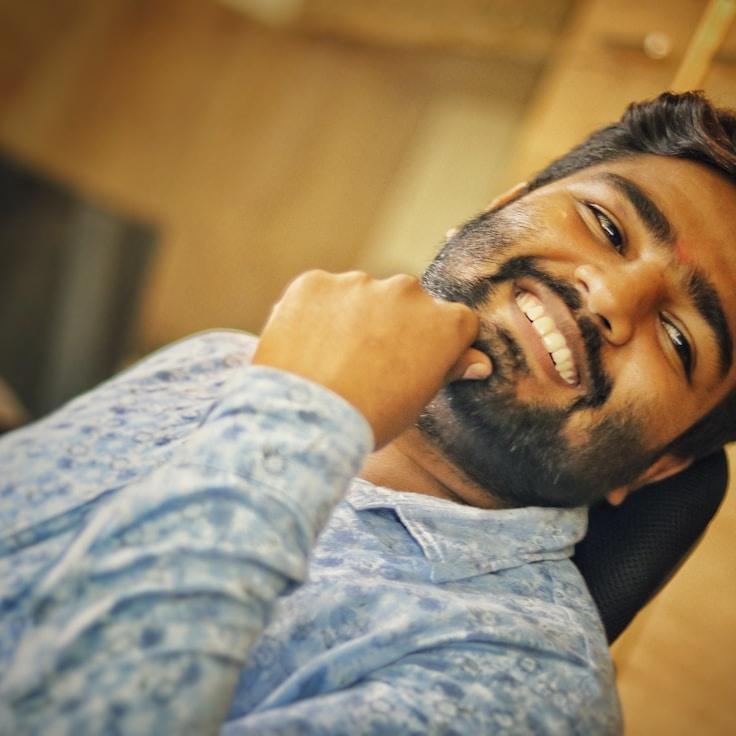 Lena Kapoor, Lead Design Curator at Whispering Pine Forest, reviewing corporate floral arrangements